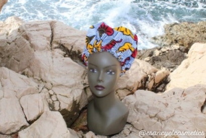 A quoi sert un bonnet de nuit protecteur en wax de coton doublé de satin ?
